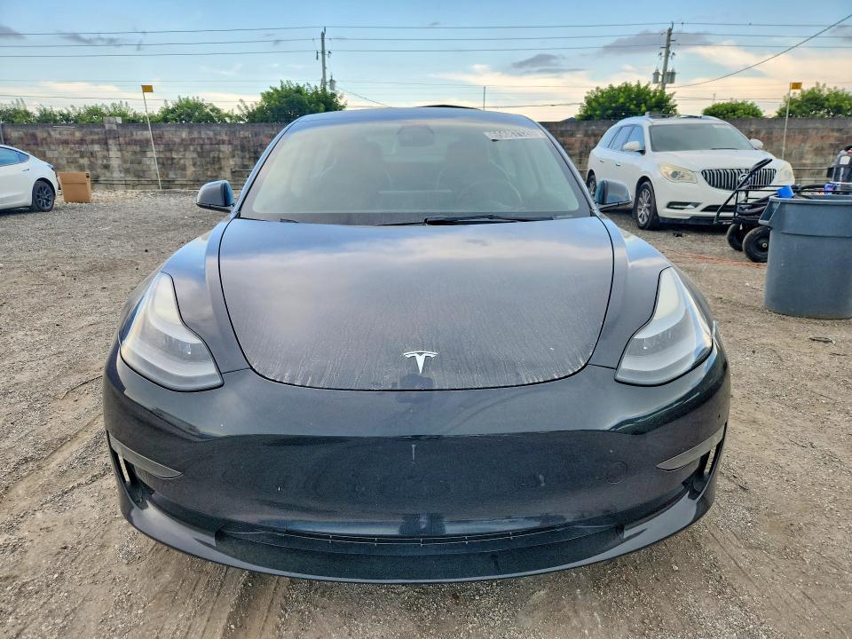 Photo 5 from auction – 2023 TESLA MODEL 3 with VIN 5YJ3E1EA5PF454116