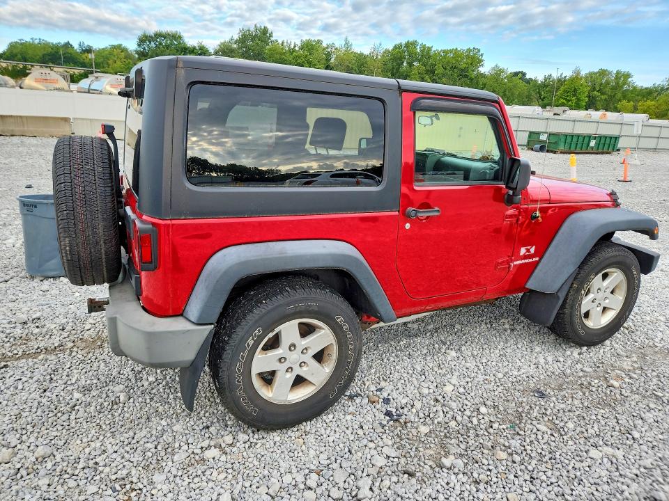 Photo 3 from auction – 2009 JEEP WRANGLER with VIN 1J4FA24119L764094