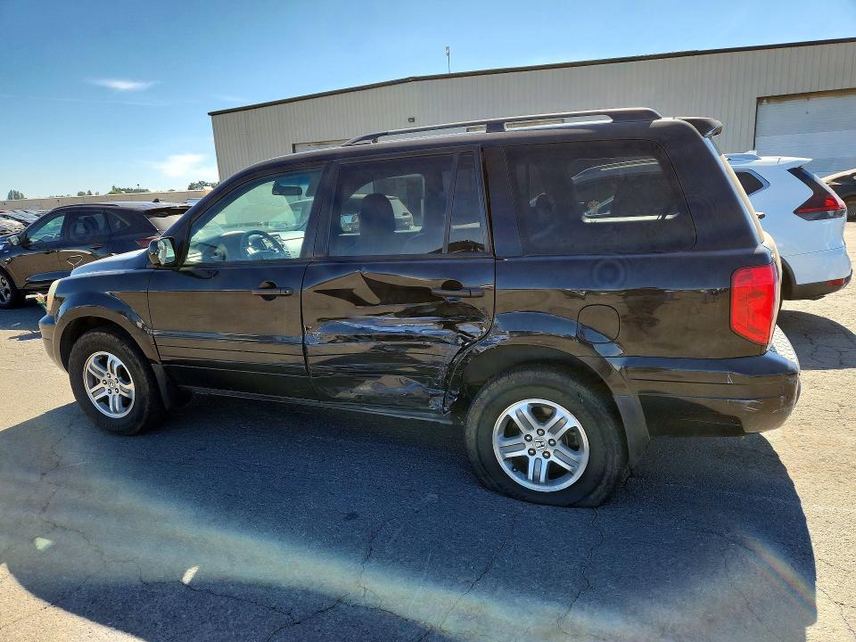 Photo 2 from auction – 2004 HONDA PILOT with VIN 2HKYF18544H574147
