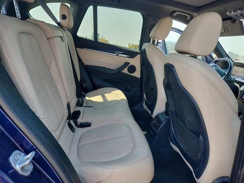 Photo 11 from auction – 2017 BMW X1 with VIN WBXHT3C35H5F82411