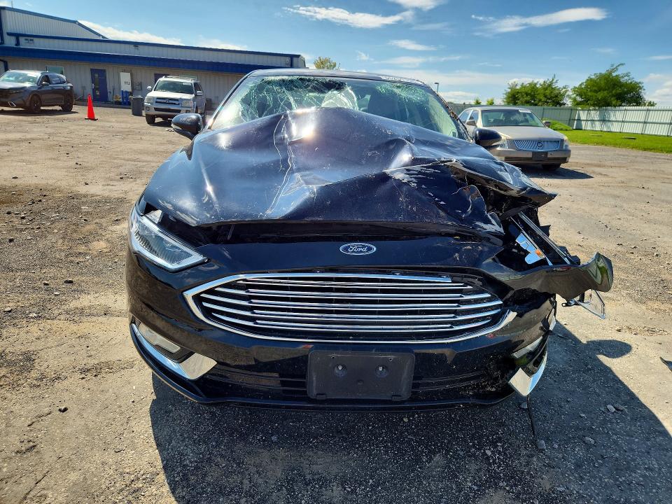 Photo 5 from auction – 2018 FORD FUSION with VIN 3FA6P0D99JR247653