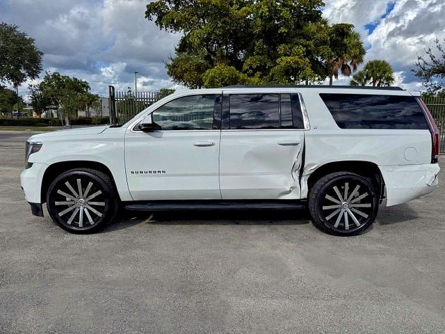 Photo 12 from auction – 2015 CHEVROLET SUBURBAN with VIN 1GNSCJKC8FR505342