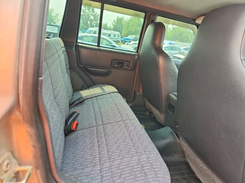 Photo 10 from auction – 2000 JEEP CHEROKEE with VIN 1J4FF48S9YL272492