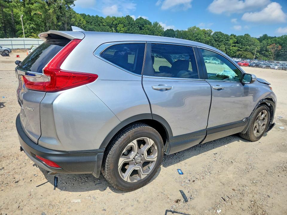 Photo 3 from auction – 2019 HONDA CR-V with VIN 7FARW2H80KE043404