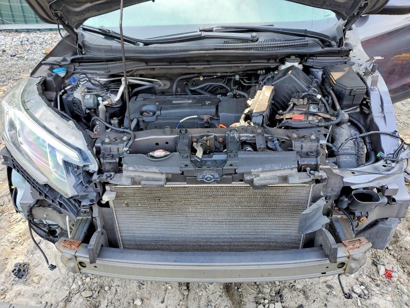 Photo 12 from auction – 2016 HONDA CR-V with VIN 5J6RM4H54GL004008