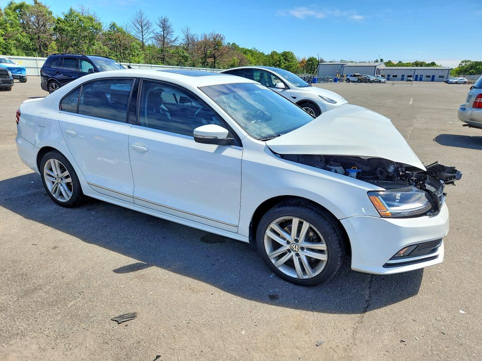 Photo 4 from auction – 2018 VOLKSWAGEN JETTA with VIN 3VWL17AJ2JM207303