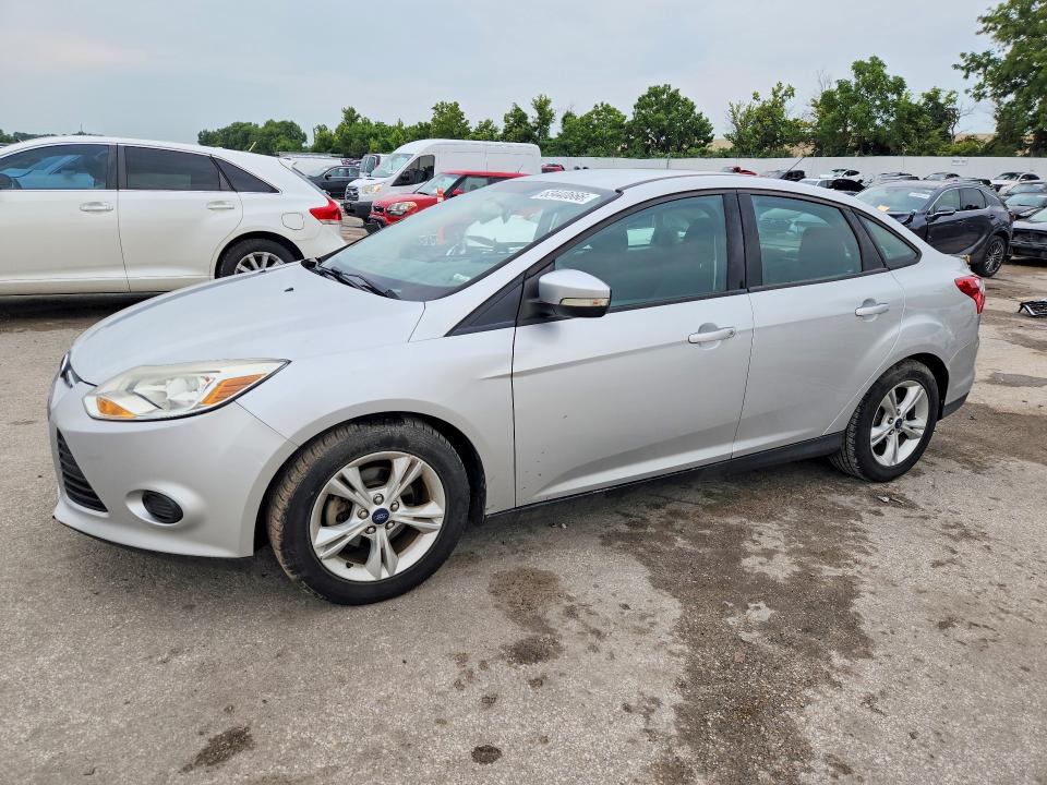 FORD FOCUS 2014 with VIN 1FADP3F27EL440803 - Photo from auction