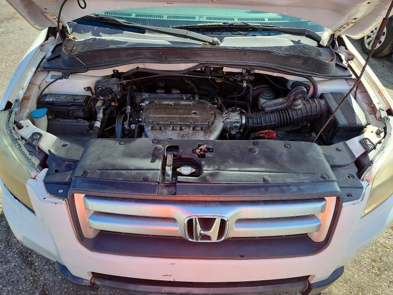 Photo 12 from auction – 2006 HONDA PILOT with VIN 5FNYF28546B046714