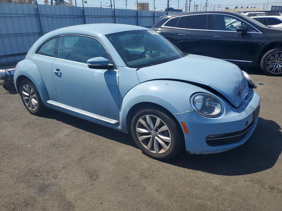 Photo 4 from auction – 2014 VOLKSWAGEN BEETLE with VIN 3VWJL7AT4EM617867