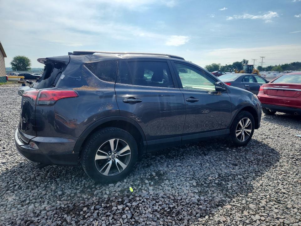 Photo 3 from auction – 2018 TOYOTA RAV4 with VIN JTMRFREV8JD222309