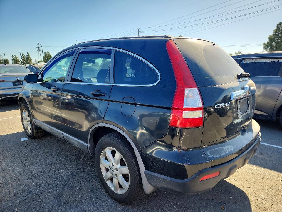 Photo 2 from auction – 2009 HONDA CR-V with VIN 5J6RE38589L013255