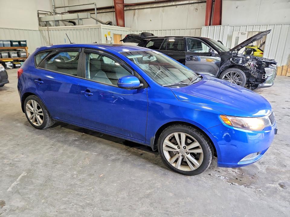 Photo 4 from auction – 2013 KIA FORTE5 with VIN KNAFW5A39D5667265