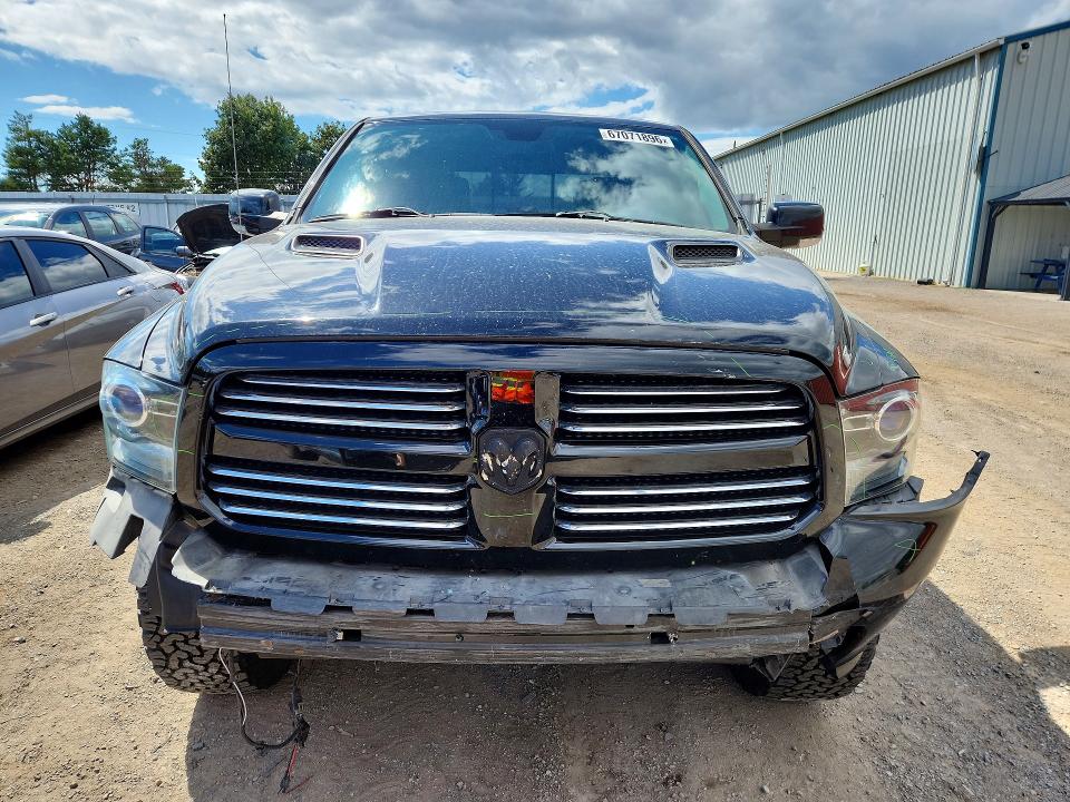 Photo 5 from auction – 2014 RAM 1500 with VIN 1C6RR7MT9ES201831