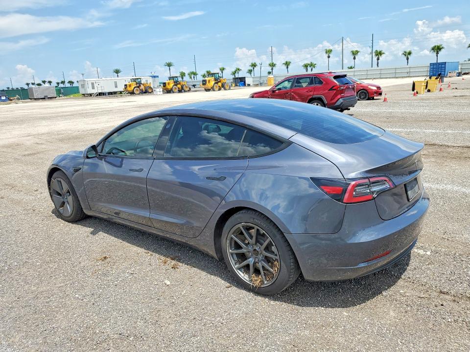 Photo 2 from auction – 2021 TESLA MODEL 3 with VIN 5YJ3E1EAXMF083076