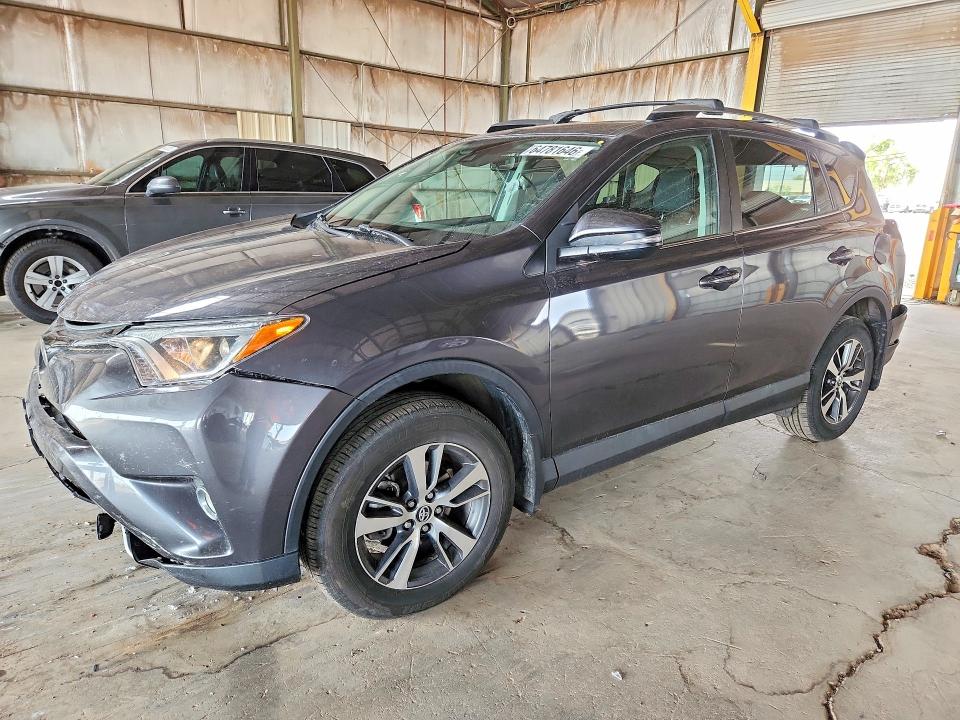 TOYOTA RAV4 2018 with VIN 2T3RFREV3JW719979 - Photo from auction