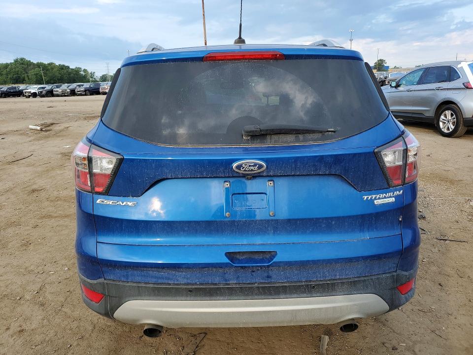 Photo 6 from auction – 2017 FORD ESCAPE with VIN 1FMCU0J90HUA60309