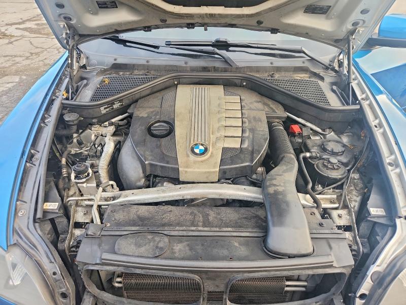 Photo 12 from auction – 2012 BMW X5 with VIN 5UXZW0C53CL670947