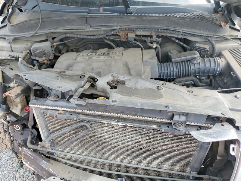 Photo 12 from auction – 2006 HONDA PILOT with VIN 5FNYF18556B015076