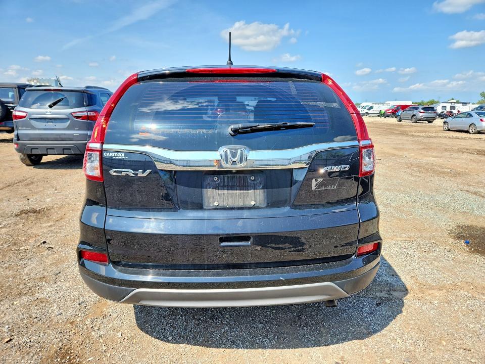 Photo 6 from auction – 2016 HONDA CR-V with VIN 5J6RM4H37GL084371