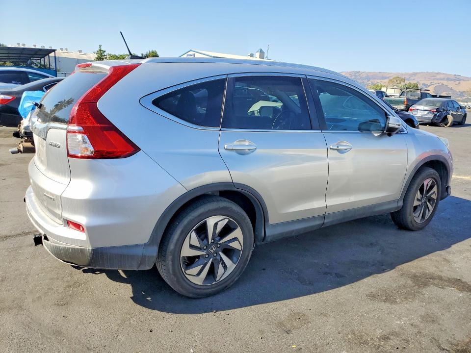 Photo 3 from auction – 2016 HONDA CR-V with VIN 5J6RM4H96GL042777