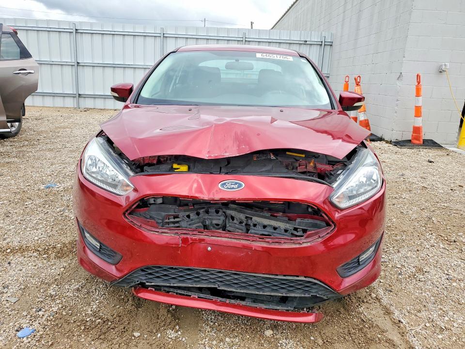 Photo 5 from auction – 2016 FORD FOCUS with VIN 1FADP3F26GL238134
