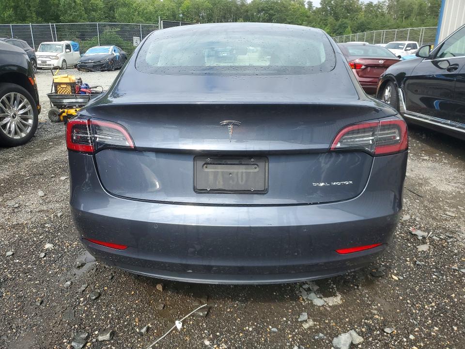 Photo 6 from auction – 2022 TESLA MODEL 3 with VIN 5YJ3E1EBXNF290934