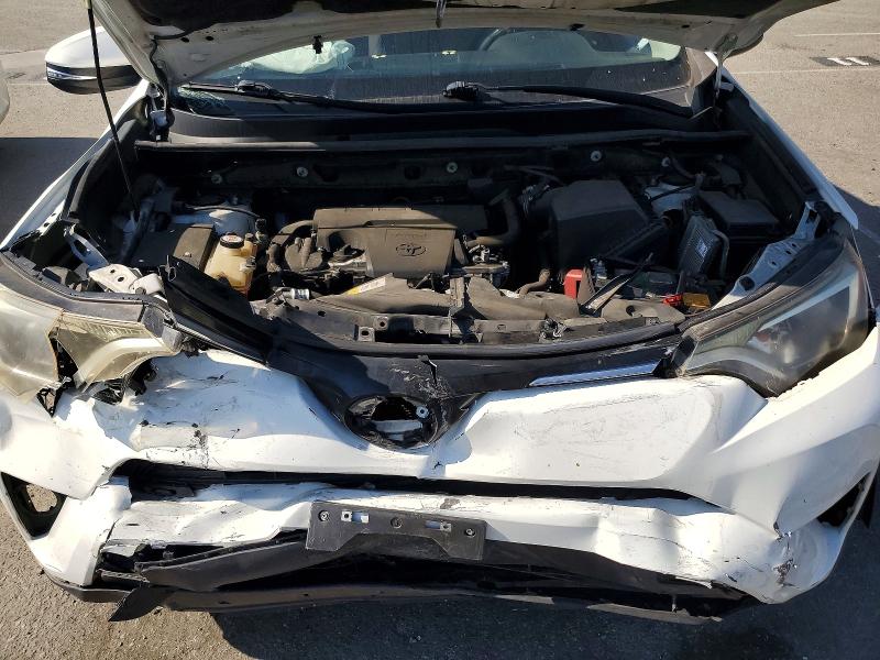 Photo 12 from auction – 2018 TOYOTA RAV4 with VIN JTMWFREV0JJ165284