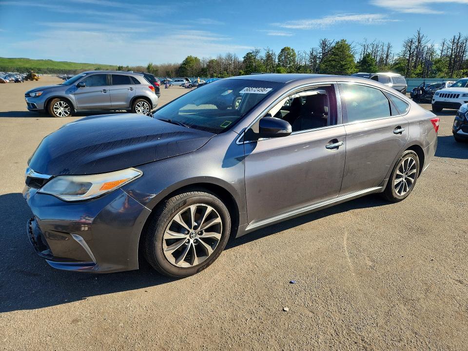 TOYOTA AVALON 2016 with VIN 4T1BK1EB4GU215544 - Photo from auction