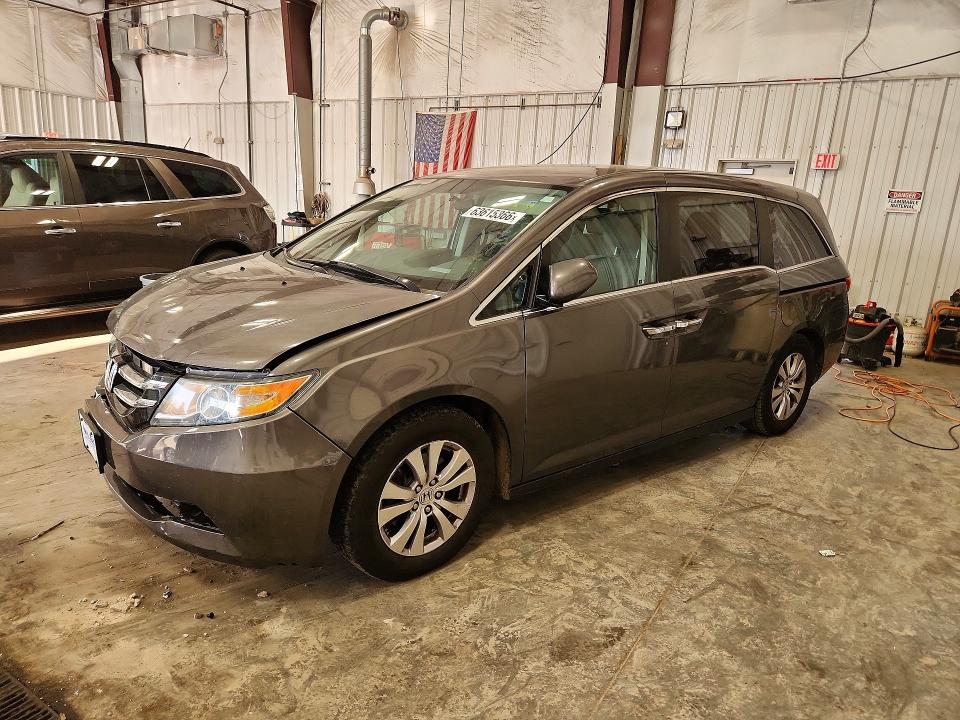 HONDA ODYSSEY 2016 with VIN 5FNRL5H3XGB138294 - Photo from auction