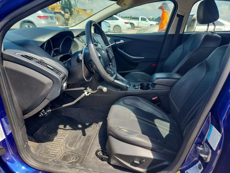 Foto 7 de la subasta – 2012 FORD FOCUS con VIN 1FAHP3N26CL320667