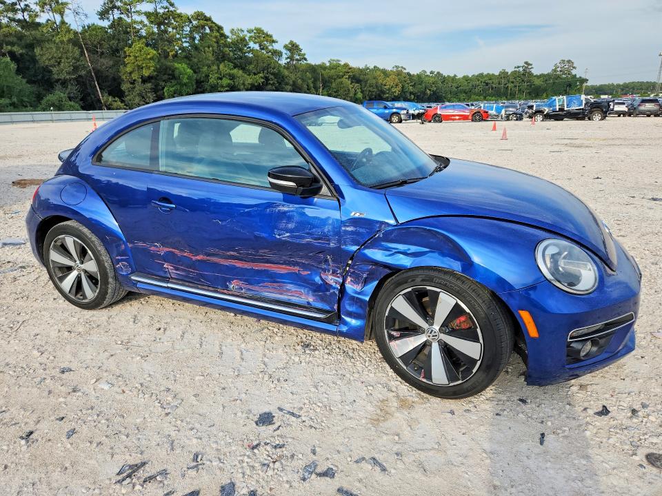 Photo 4 from auction – 2014 VOLKSWAGEN BEETLE with VIN 3VWVS7AT8EM662430