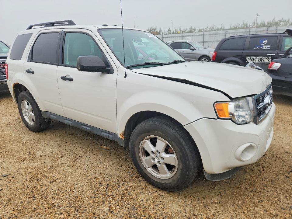 Photo 4 from auction – 2011 FORD ESCAPE with VIN 1FMCU0DGXBKA24074