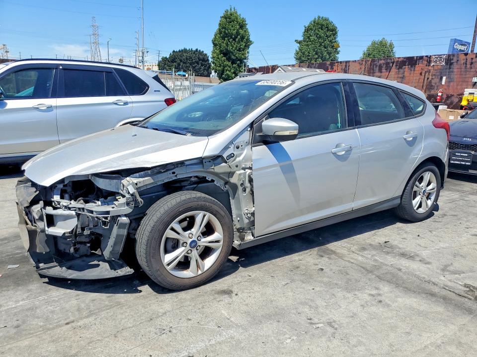 FORD FOCUS 2014 with VIN 1FADP3K21EL432220 - Photo from auction