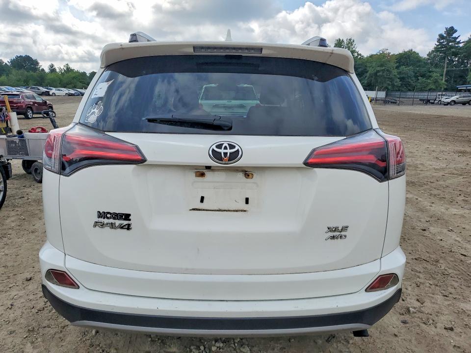 Photo 6 from auction – 2018 TOYOTA RAV4 with VIN JTMRFREV0JJ726466