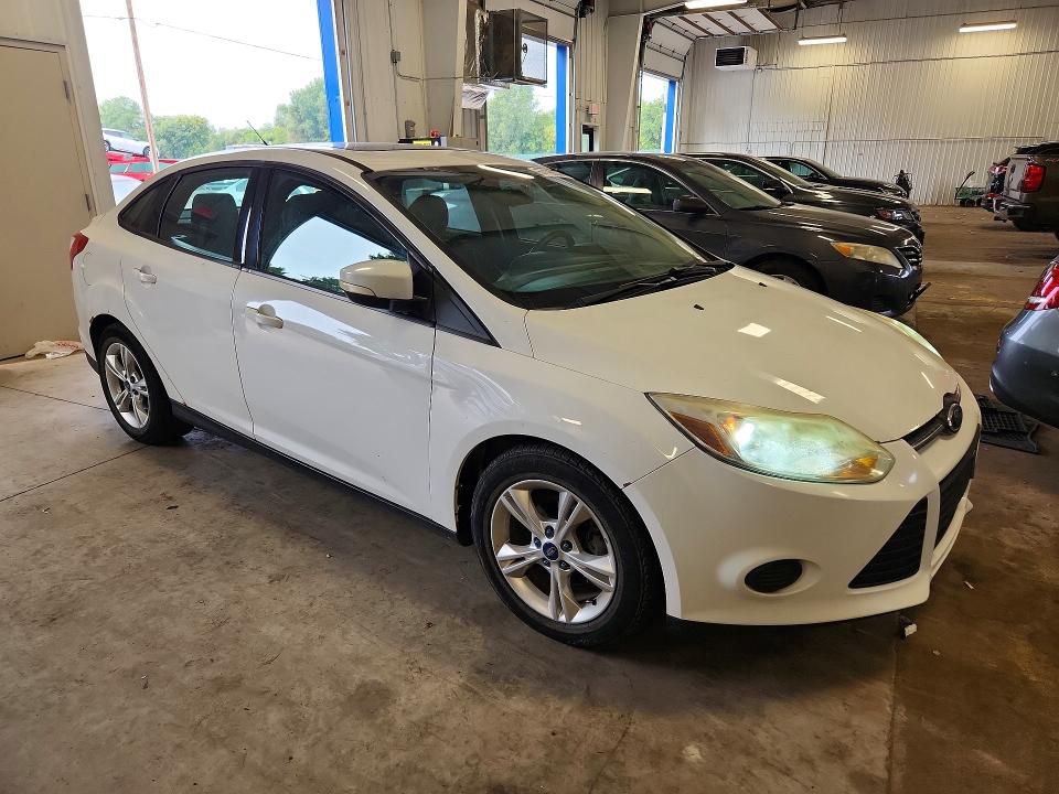 Photo 4 from auction – 2014 FORD FOCUS with VIN 1FADP3F22EL277090