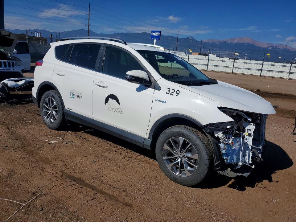 Снимка 4 от търг – 2018 TOYOTA RAV4 HYBRID с VIN JTMRJREV2JD222482