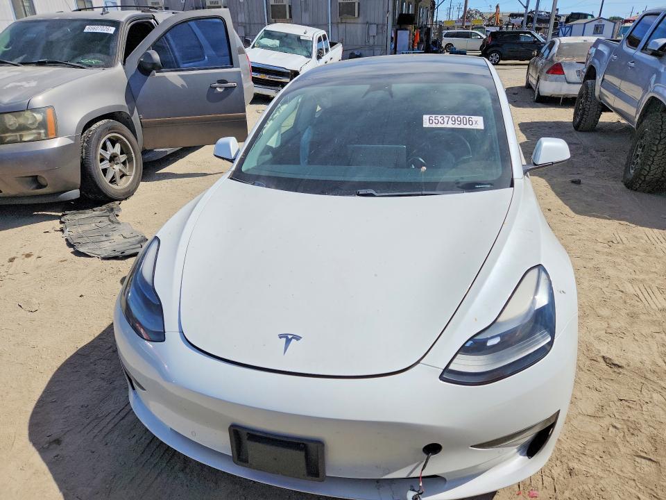Photo 5 from auction – 2021 TESLA MODEL 3 with VIN 5YJ3E1EC1MF935929