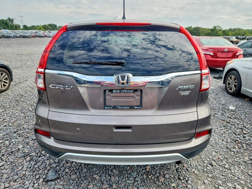 Photo 6 from auction – 2016 HONDA CR-V with VIN 5J6RM4H56GL057065