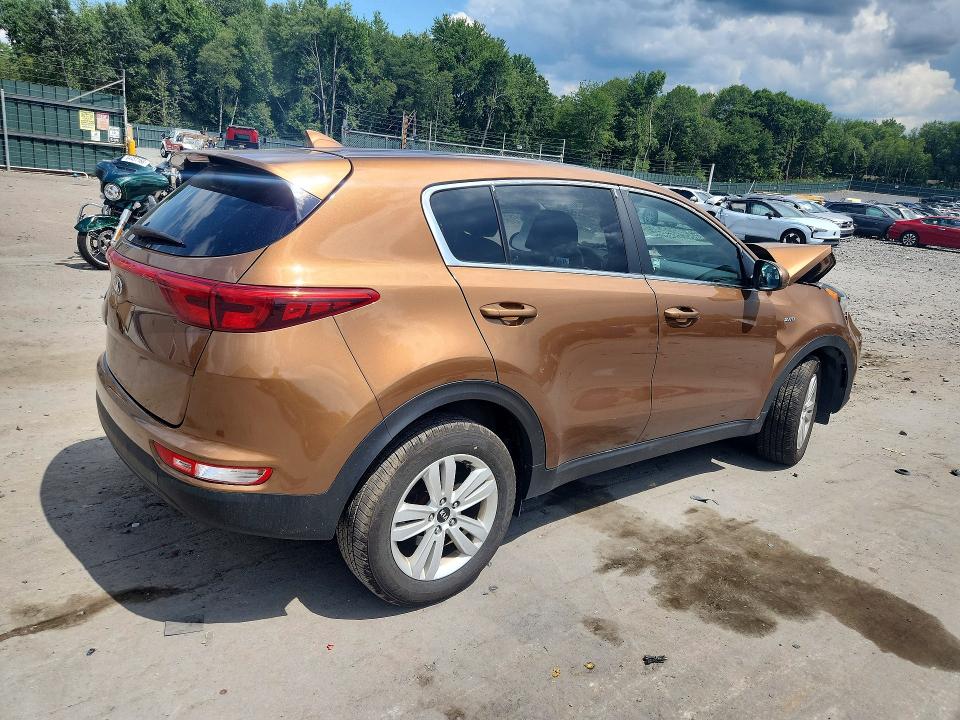 Photo 3 from auction – 2000 KIA SPORTAGE with VIN KNDPMCAC4K7575225