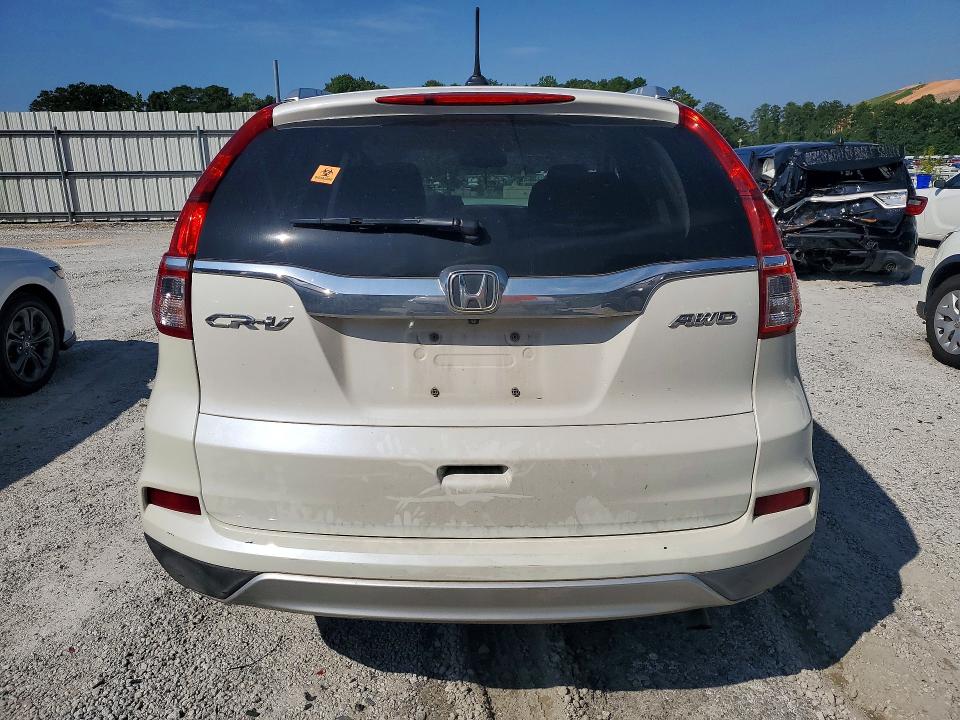 Photo 6 from auction – 2016 HONDA CR-V with VIN 5J6RM4H77GL080260