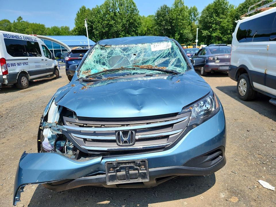 Photo 5 from auction – 2014 HONDA CR-V with VIN 2HKRM4H31EH660463