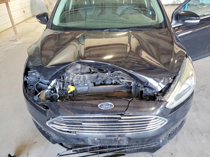 Photo 12 from auction – 2016 FORD FOCUS with VIN 1FADP3N2XGL335869