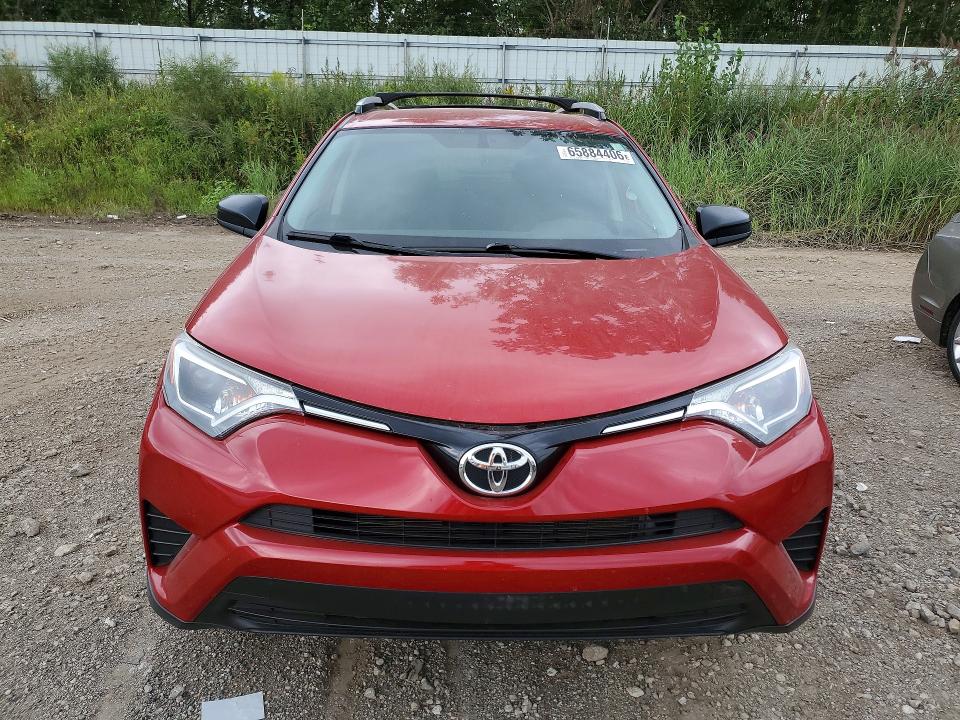 Photo 5 from auction – 2016 TOYOTA RAV4 with VIN JTMBFREV7GJ063794