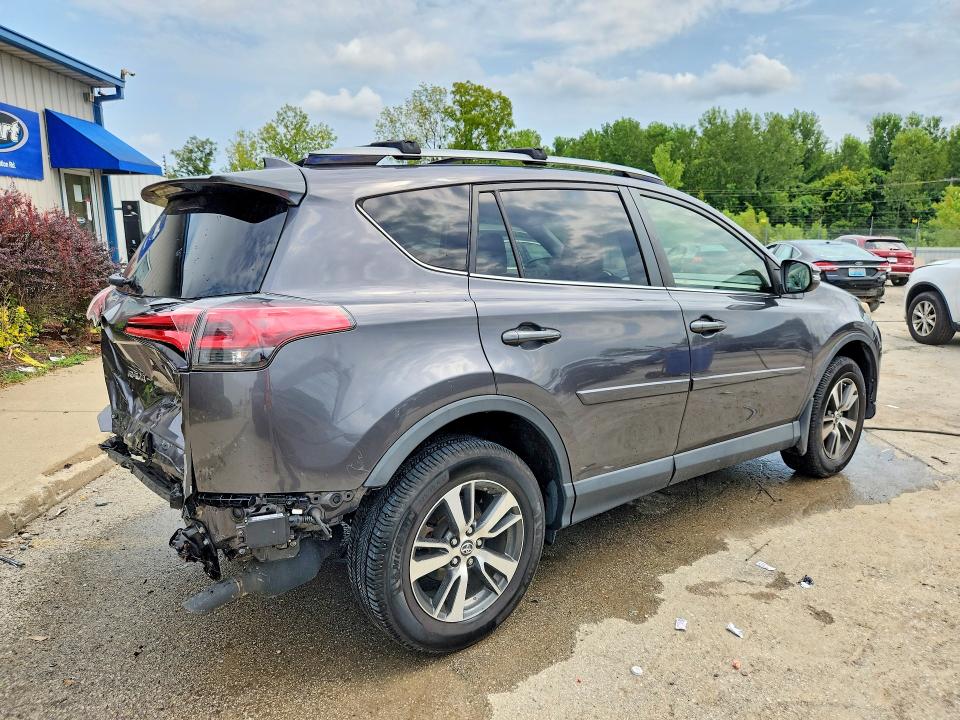 Photo 3 from auction – 2018 TOYOTA RAV4 with VIN JTMWFREV1JJ201516