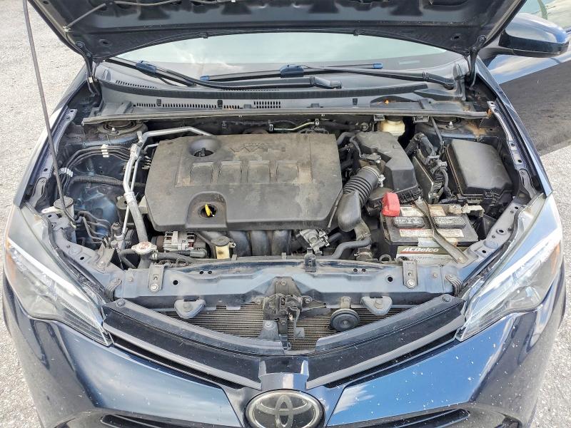 Photo 11 from auction – 2018 TOYOTA COROLLA with VIN 5YFBURHE0JP779991