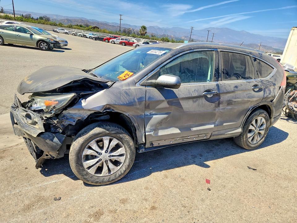 Photo 1 from auction – 2013 HONDA CR-V with VIN 2HKRM3H71DH523292