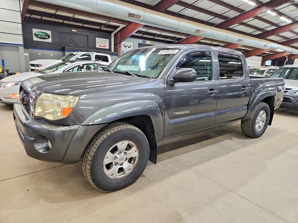 TOYOTA TACOMA 2011 with VIN 3TMLU4ENXBM068884 - Photo from auction