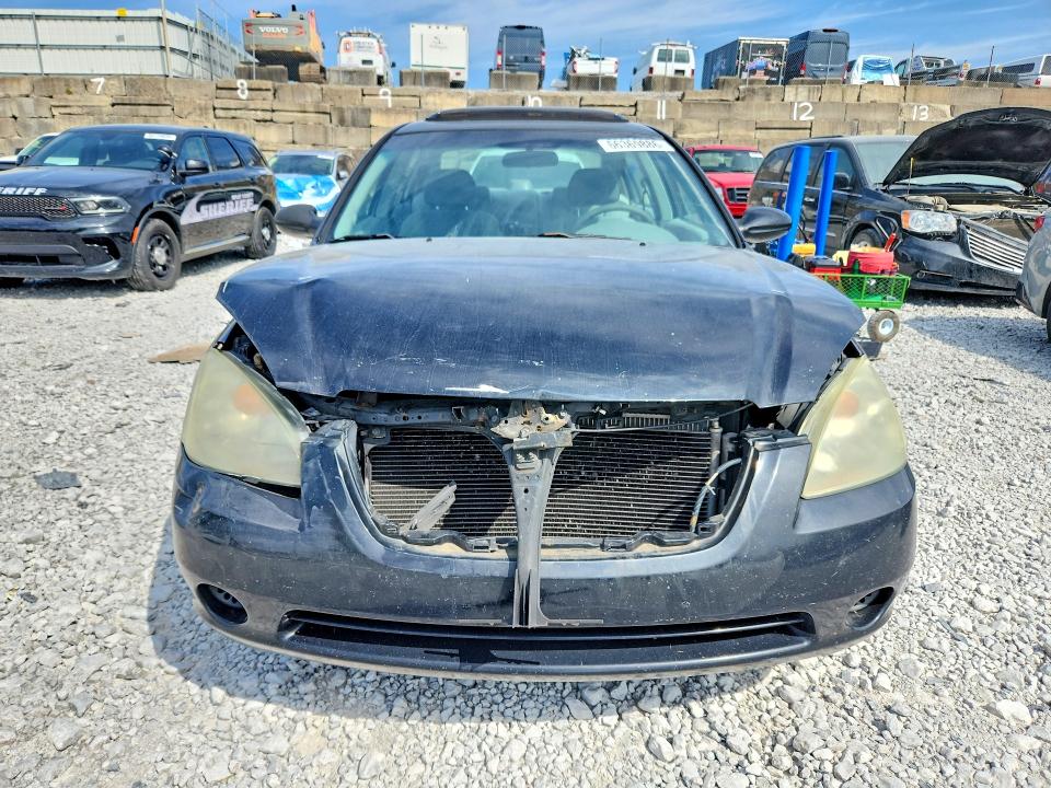 Photo 5 from auction – 2003 NISSAN ALTIMA with VIN 1N4AL11D53C282180