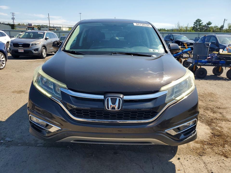 Photo 5 from auction – 2015 HONDA CR-V with VIN 2HKRM4H58FH611585