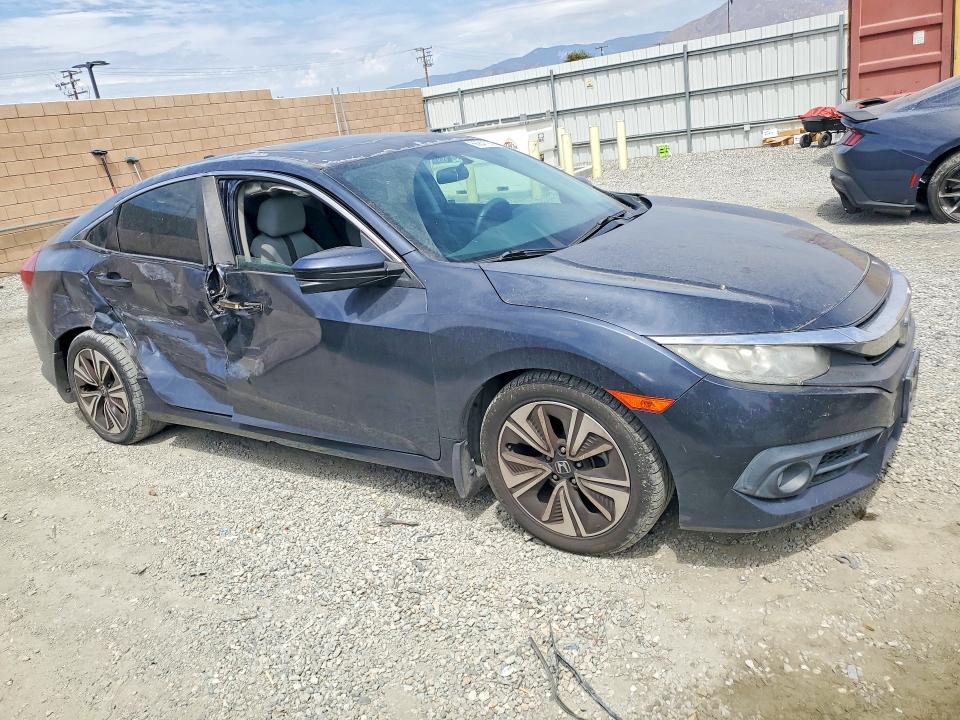 Photo 4 from auction – 2017 HONDA CIVIC with VIN 2HGFC1F33HH642827